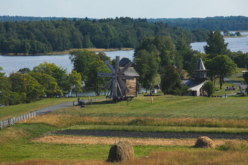 Fototapeta premium Kizhi Island and Kizhi Pogost wooden church open-air museum, summer vibrant view of Onega Lake, Medvezhyegorsky District, Republic of Karelia, Russia