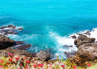 Beautiful Seaside Rocky Cliff With Blue Water