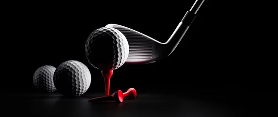 Gordijnen Golf ball with club and red tee on black background - studio shot © peterschreiber.media