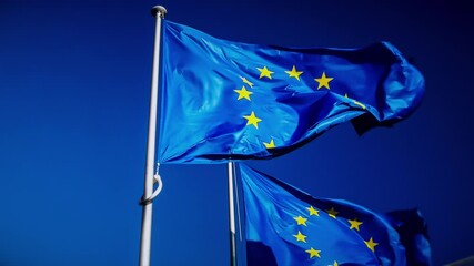 Close up of waving EU flags. Brussels, Belgium. 4K - Powered by Adobe