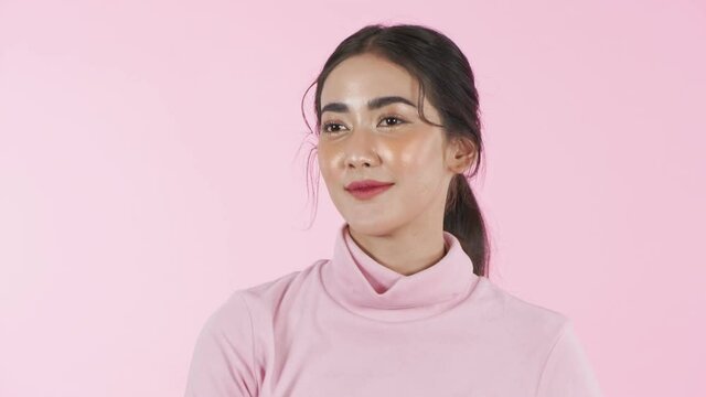 Beauty concept of 4k Resolution. Asian women are cheerful on a pink background.