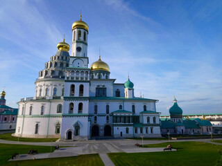 Christian Orthodox Monastery with white walls and golden domes