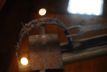 old lock old door old trap world war II 2 vintage on a wooden table