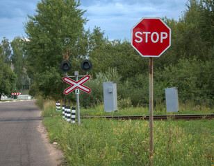 stop sign on a railway
