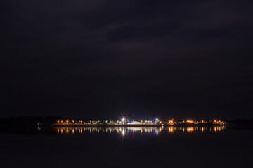 Night shot of the Uruguay River&acute;s coast and the little town of Santa Ana, Entre r&iacute;os, Argentina on a cloudy night.