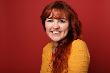 Beautiful woman in front of a colored background