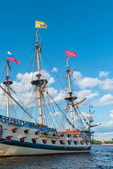 Side view of the Russian old military sailing ship Poltava, parked on the Neva River against the...