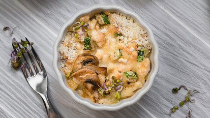 Close-up casserole with turkey, zucchini and cheese 
