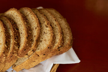Sliced gluten-free vegan bread in a wooden basket. Healthy eating concept.