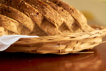 Sliced gluten-free vegan bread in a wooden basket. Healthy eating concept.