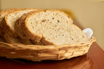 Sliced gluten-free vegan bread in a wooden basket. Healthy eating concept.