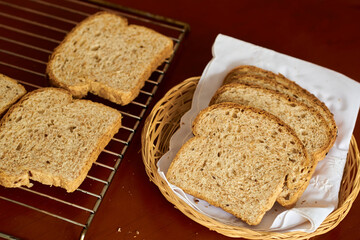 Sliced gluten-free vegan bread in a wooden basket. Healthy eating concept.