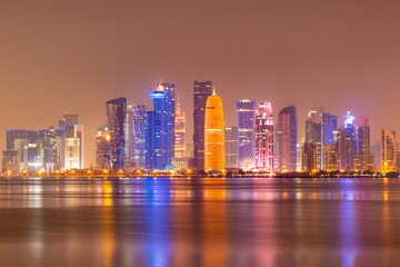 Fototapeta na wymiar Illuminated skyline of Doha at night, Qatar, Middle East.