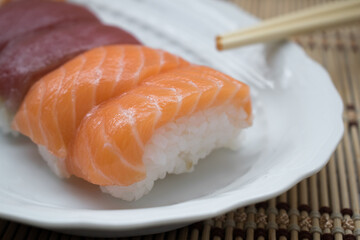 Close-up of fresh nigiri in a white plate