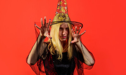 Halloween Party girl. Young woman in witch hat. Costume for party.