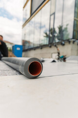 Synthetic PVC membranes for waterproof system. Details with hot air welding and membrane rollers
