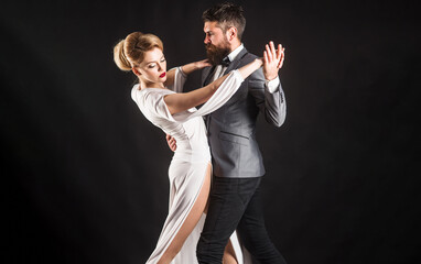 Couple dancing tango. Ballroom dance. Passion and love concept.