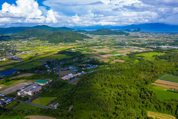 Fototapeta na wymiar 鹿児島県指宿市の開聞岳をドローンで撮影した空撮映像 Aerial footage of Mount Kaimon-dake in Ibusuki City, Kagoshima Prefecture, taken by drone.