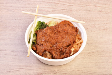 Taiwanese ribs bento on wooden table