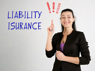 Business concept about LIABILITY ISURANCE exclamation marks with phrase on the gray wall