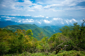 Fototapeta premium 群馬県前橋市、桐生市にある赤城山、黒檜山、地蔵岳を登山している風景 Scenery of climbing Mt. Akagi, Mt. Kurobi-san and Mt. Jizo-dake in Maebashi and Kiryu, Gunma Prefecture. 