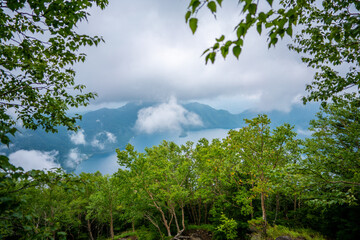 Obraz premium 栃木県日光市の男体山に登山している風景 A view of climbing Mt. Ottai in Nikko City, Tochigi Prefecture. 