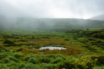 大分県玖珠郡九重町、竹田市久住町のくじゅう連山を登山している風景 A scene of climbing the Kujyu mountain range in Kusu-gun, Kokonoe-machi and Takeda-shi, Oita Prefecture. 