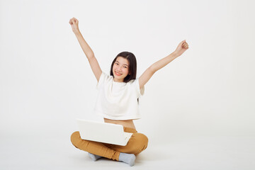 woman attractive sitting on the floor using laptop