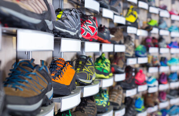 Image of large selection of sport color shoes in shop..