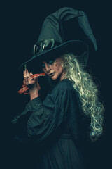 green witch with poisonous snake