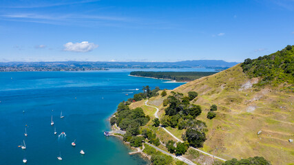 Aerial View from Houses close to the Beach, Green Trees, Mountain, Mount Maunganui, Boats in Tauranga, New Zealand  - Bay of Plenty