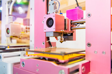 3D printer or additive manufacturing and robotic automation technology.