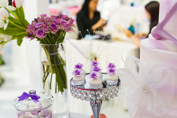 Wedding decoration with colorful cakes and biscuit