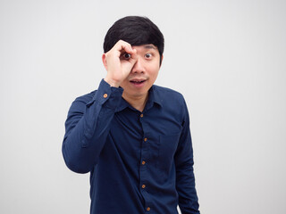 Man loooking pass his hand on his face on white background