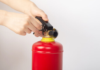 Dry powder fire extinguisher on white background