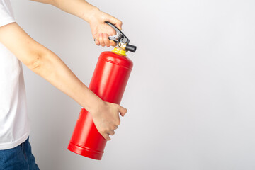 Dry powder fire extinguisher on white background