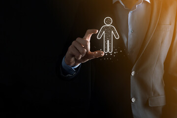 Businessman holds man person icon on dark tone background.HR Human ,people iconTechnology Process System Business with Recruitment, Hiring, Team Building. Organisation structure concept