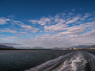 Leaving Cairns Harbour with Boat Wake and View to Cairns