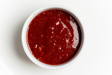 bbq sauce in the white bowl