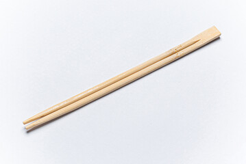 wooden chopsticks on the white background