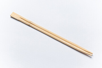 wooden chopsticks on the white background