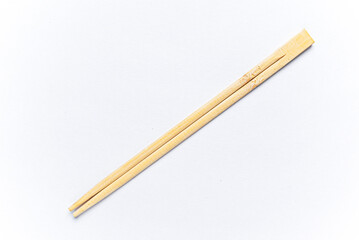 wooden chopsticks on the white background