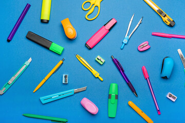 School supplies on color background