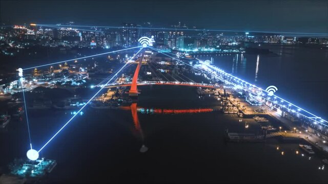 Aerial hyperlapse over port and and harbor connecting communication with wireless signals. Harbor of Taipei City at night - Futuristic technology in Asia