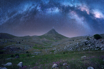mountain in the mountain area of the gran sasso abruzzo at night with the milky way