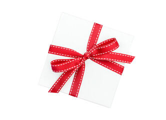 White gift box with red ribbon isolated on white background