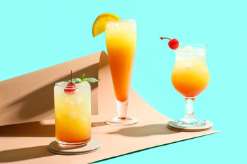 Glasses of tasty Sex on the Beach cocktail on color background
