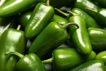 Gardinen Chilischoten Green jalapeno peppers as background, closeup  © Pixel-Shot