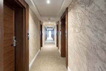 Interior of a long hotel corridor doorway