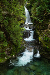 Avalanche Creek Waterfall in the rain, Arthur’s Pass, South Island. Vertical format